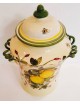 Potiche in ceramica  con fiori e frutti ammannati 